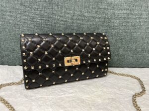rockstud-spike-nappa-leather-crossbody-clutch-bag